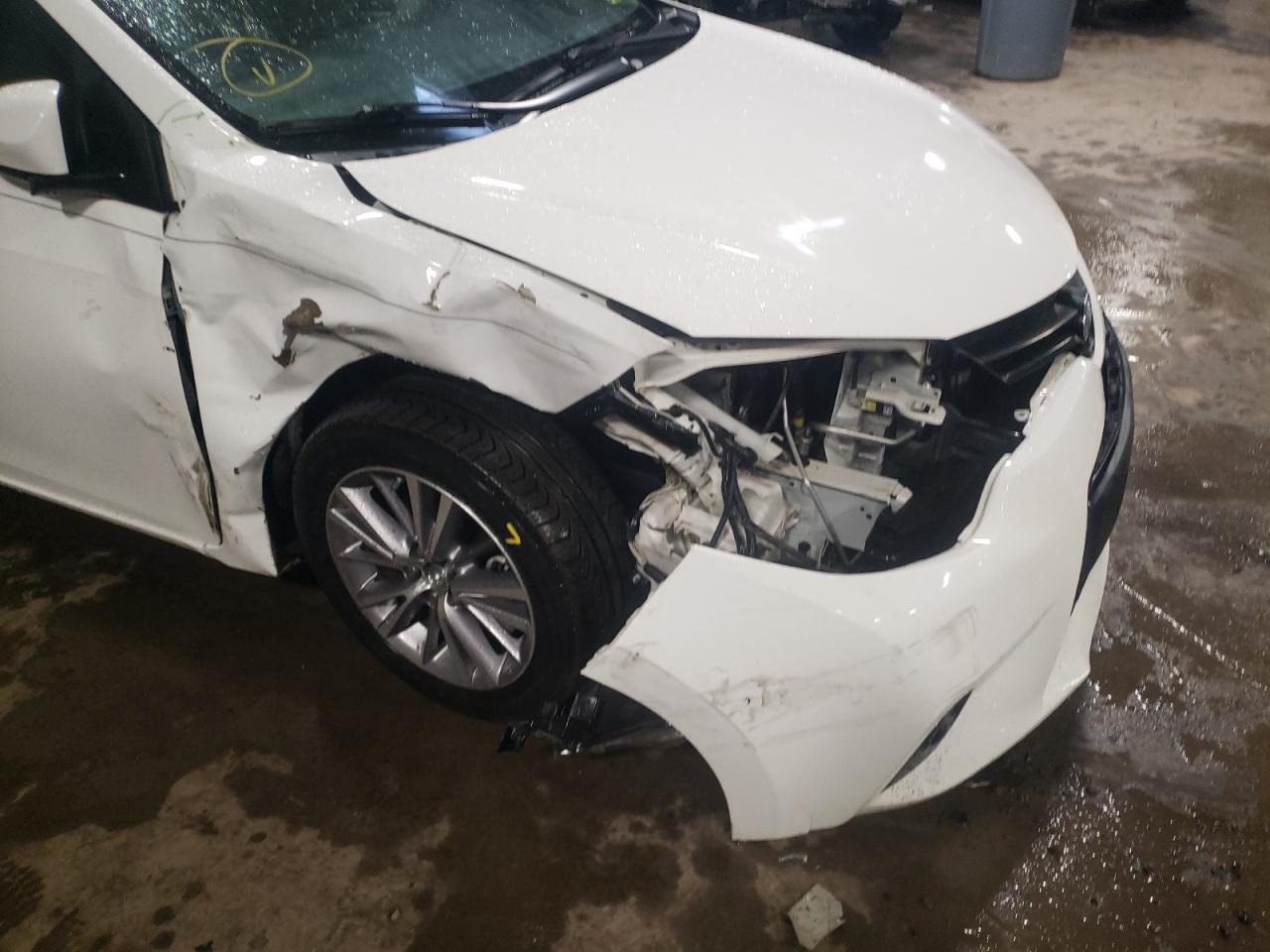 Photo 9 from auction – 2014 TOYOTA COROLLA L with VIN 5YFBURHE3EP102536