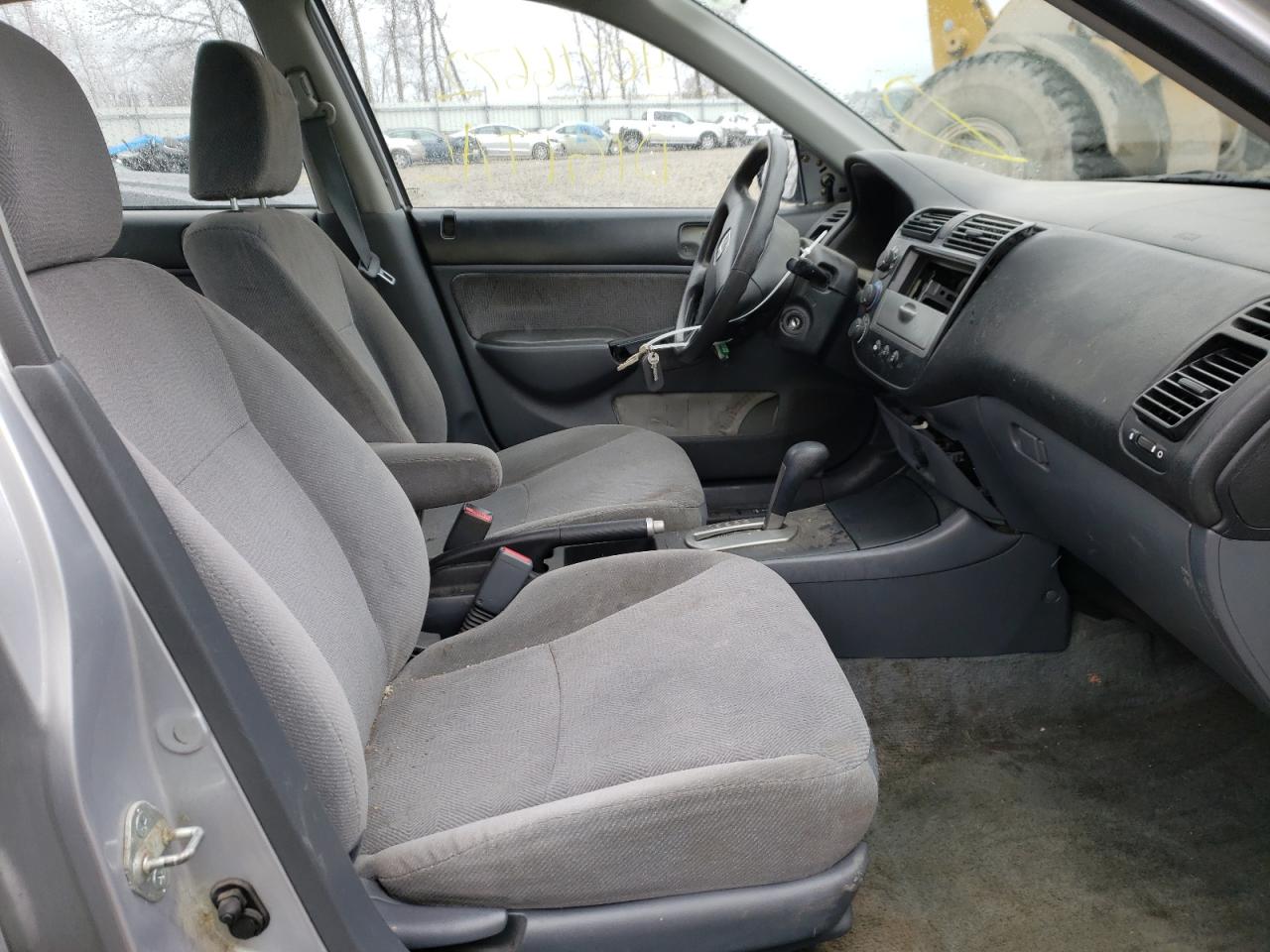 Photo 5 from auction – 2002 HONDA CIVIC LX with VIN 1HGES16522L034467