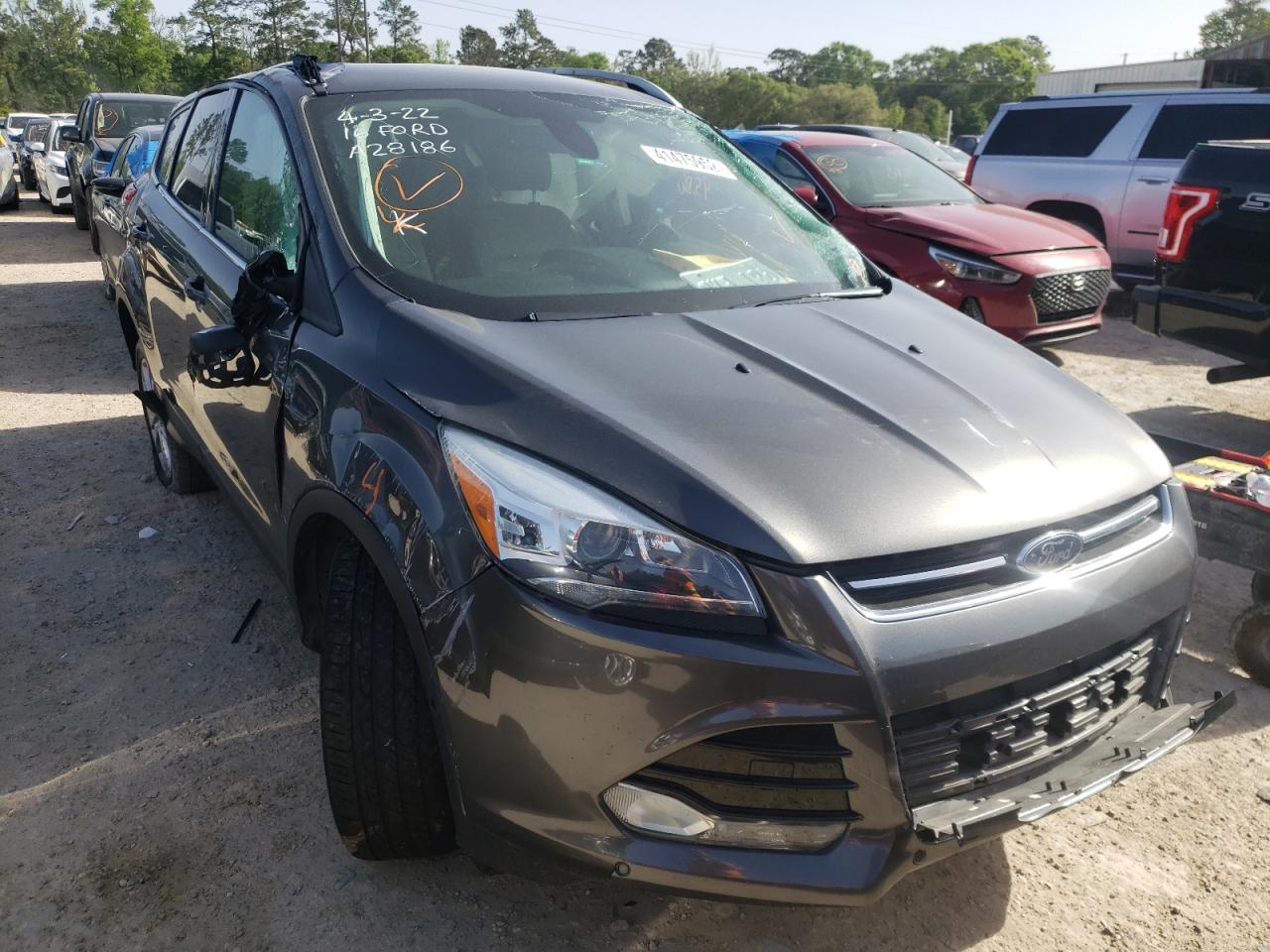 FORD ESCAPE TIT 2016 with VIN 1FMCU0JX8GUA28186 - Photo from auction