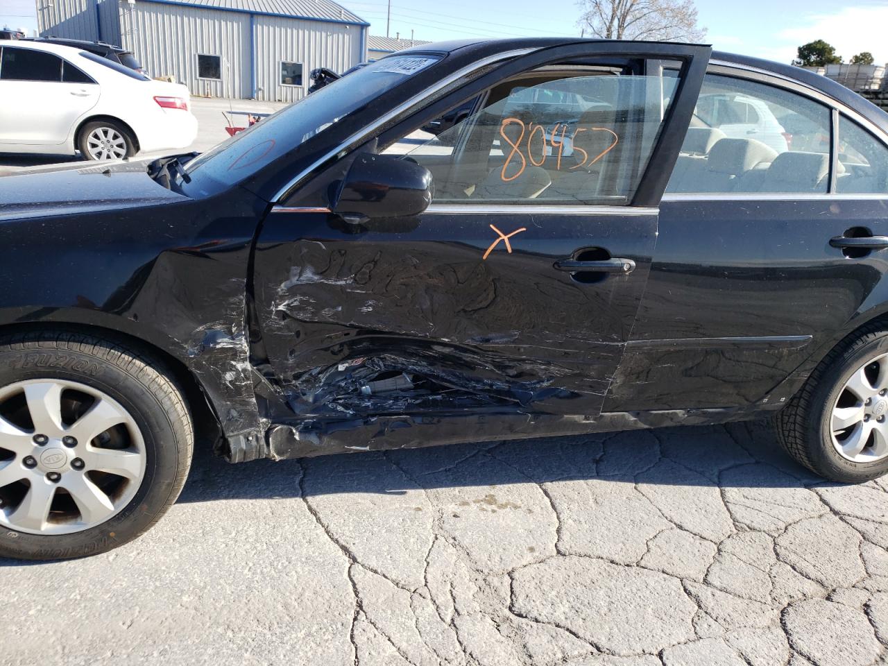 Photo 9 from auction – 2008 KIA OPTIMA LX with VIN KNAGE124485177989