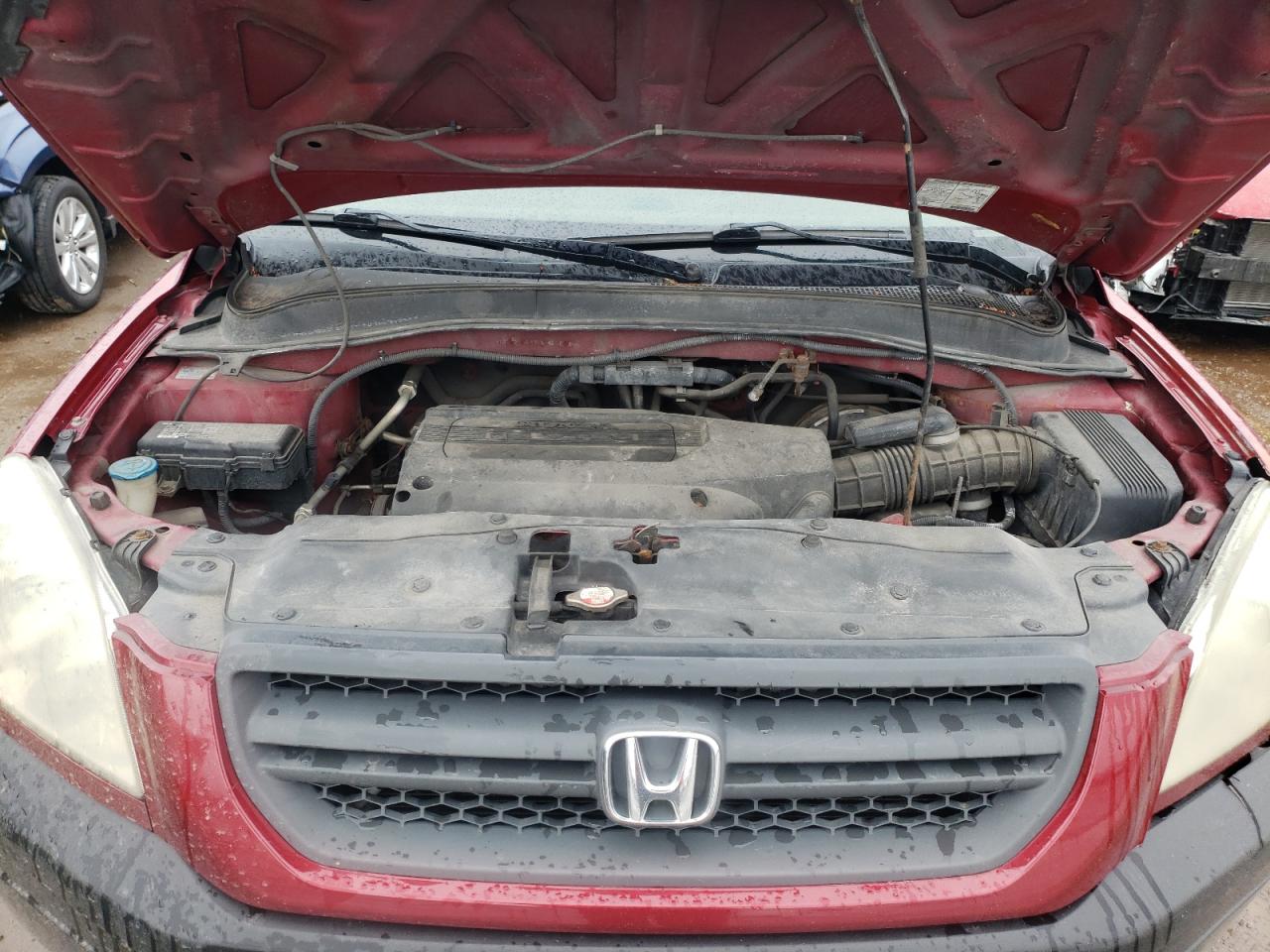 Photo 7 from auction – 2004 HONDA PILOT LX with VIN 2HKYF18154H616953