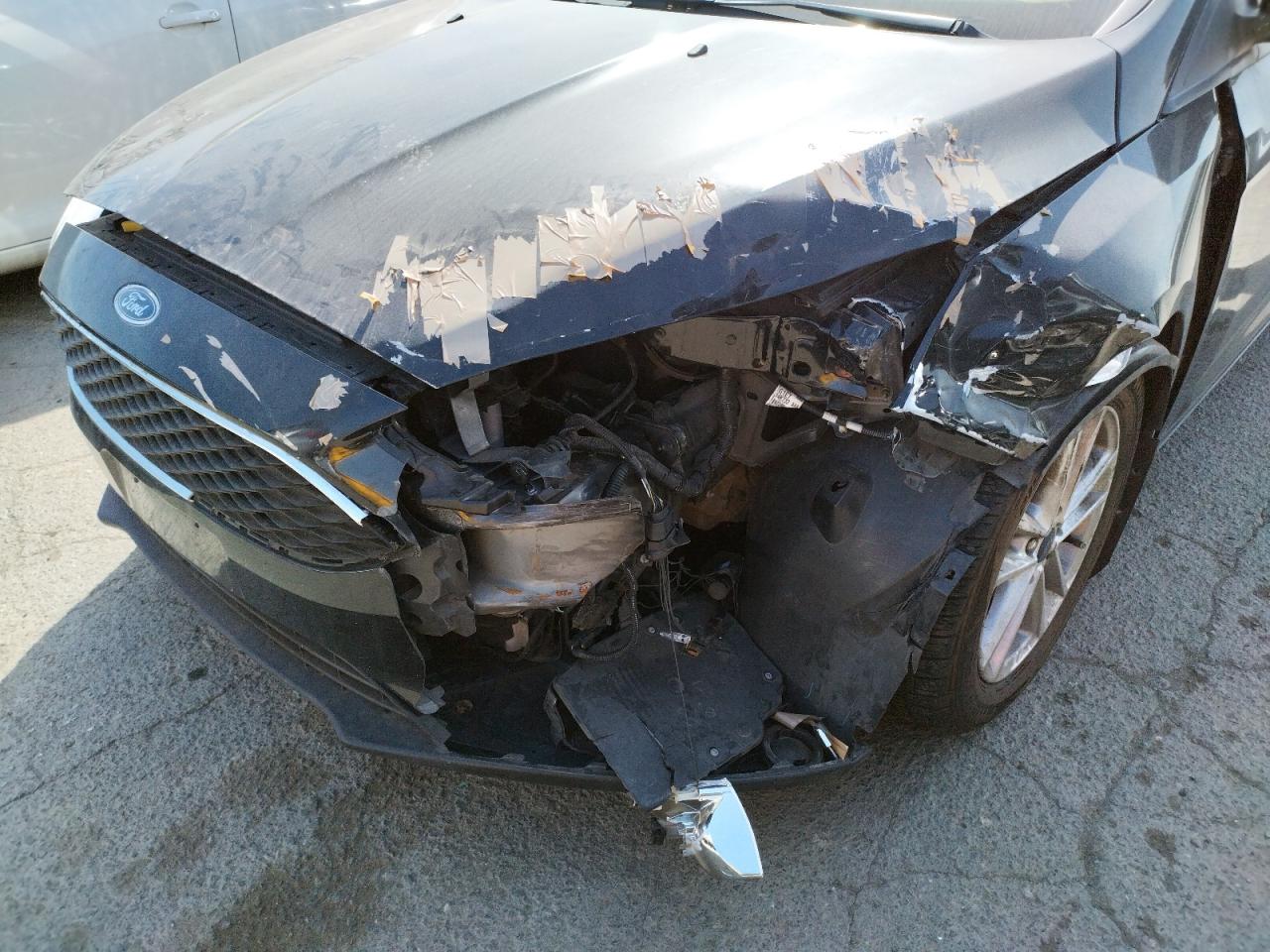 Photo 9 from auction – 2016 FORD FOCUS SE with VIN 1FADP3K28GL287891