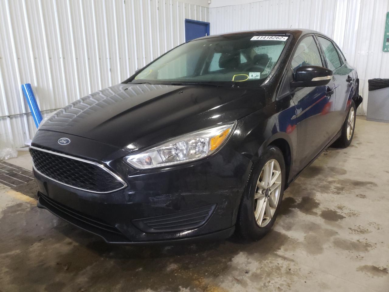 Photo 2 from auction – 2015 FORD FOCUS SE with VIN 1FADP3F24FL378083