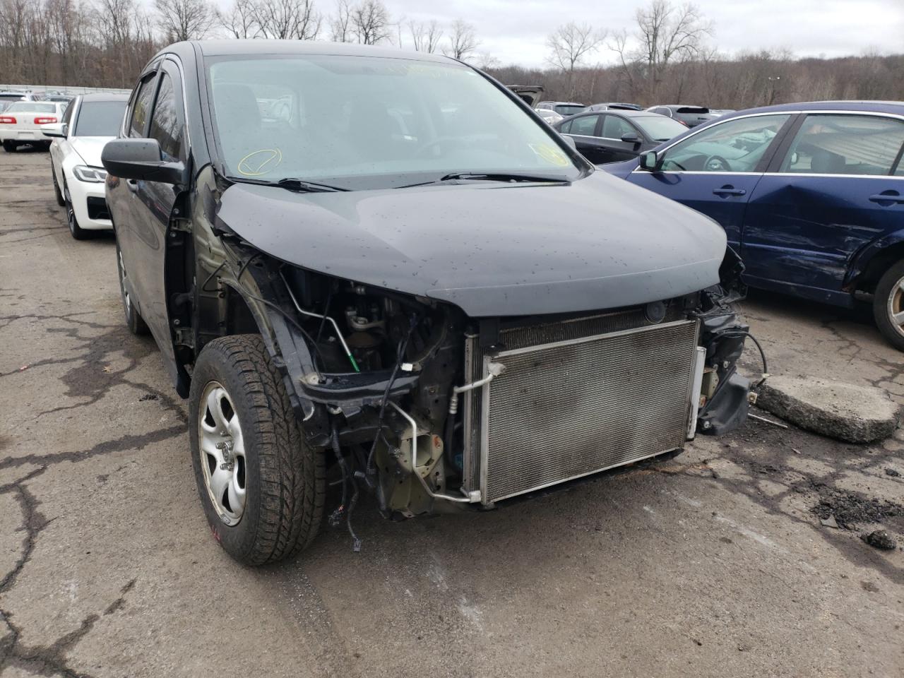 Photo 9 from auction – 2014 HONDA CR-V LX with VIN 2HKRM4H3XEH664656