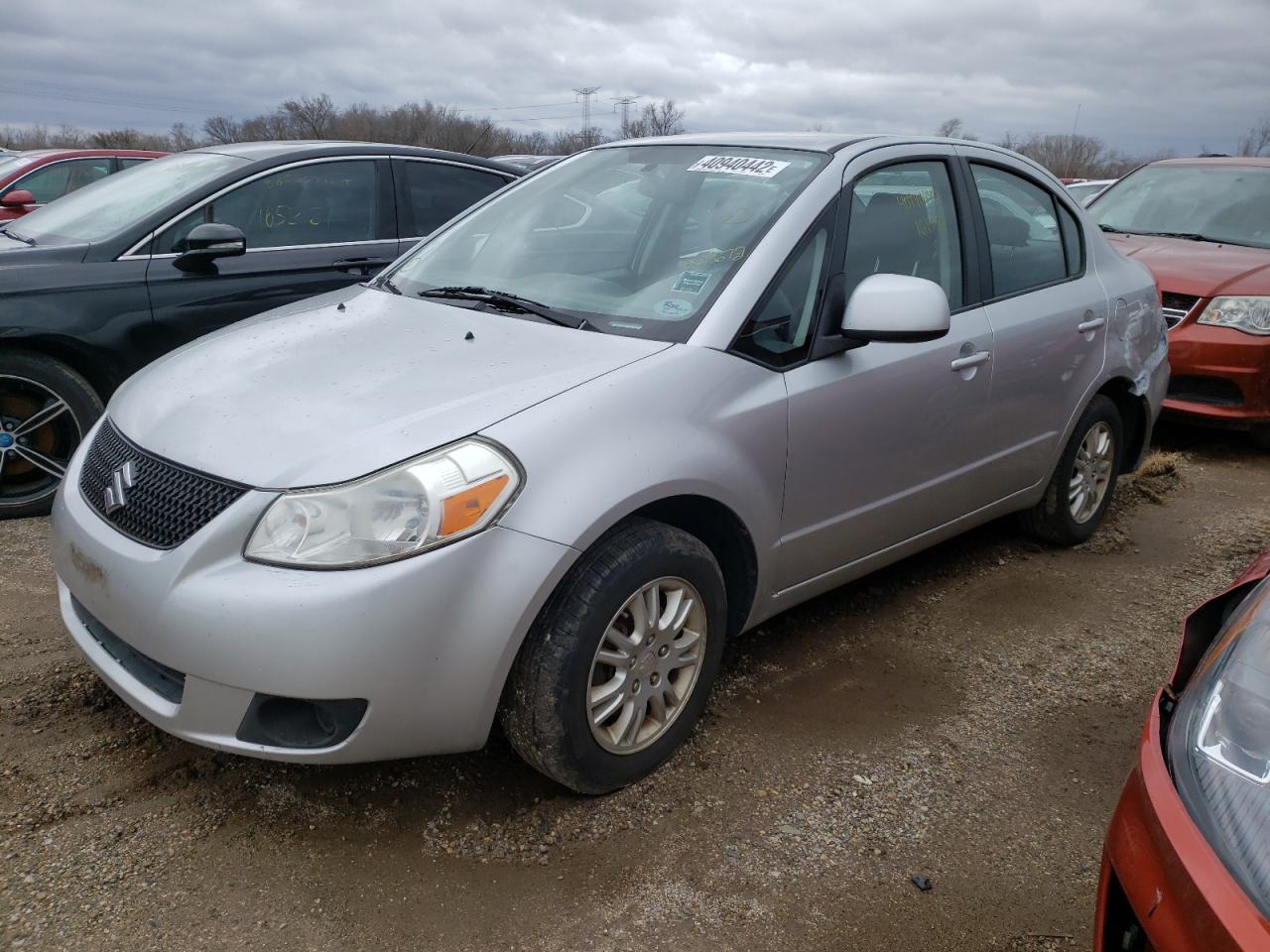 Photo 2 from auction – 2012 SUZUKI SX4 LE with VIN JS2YC5A31C6304672