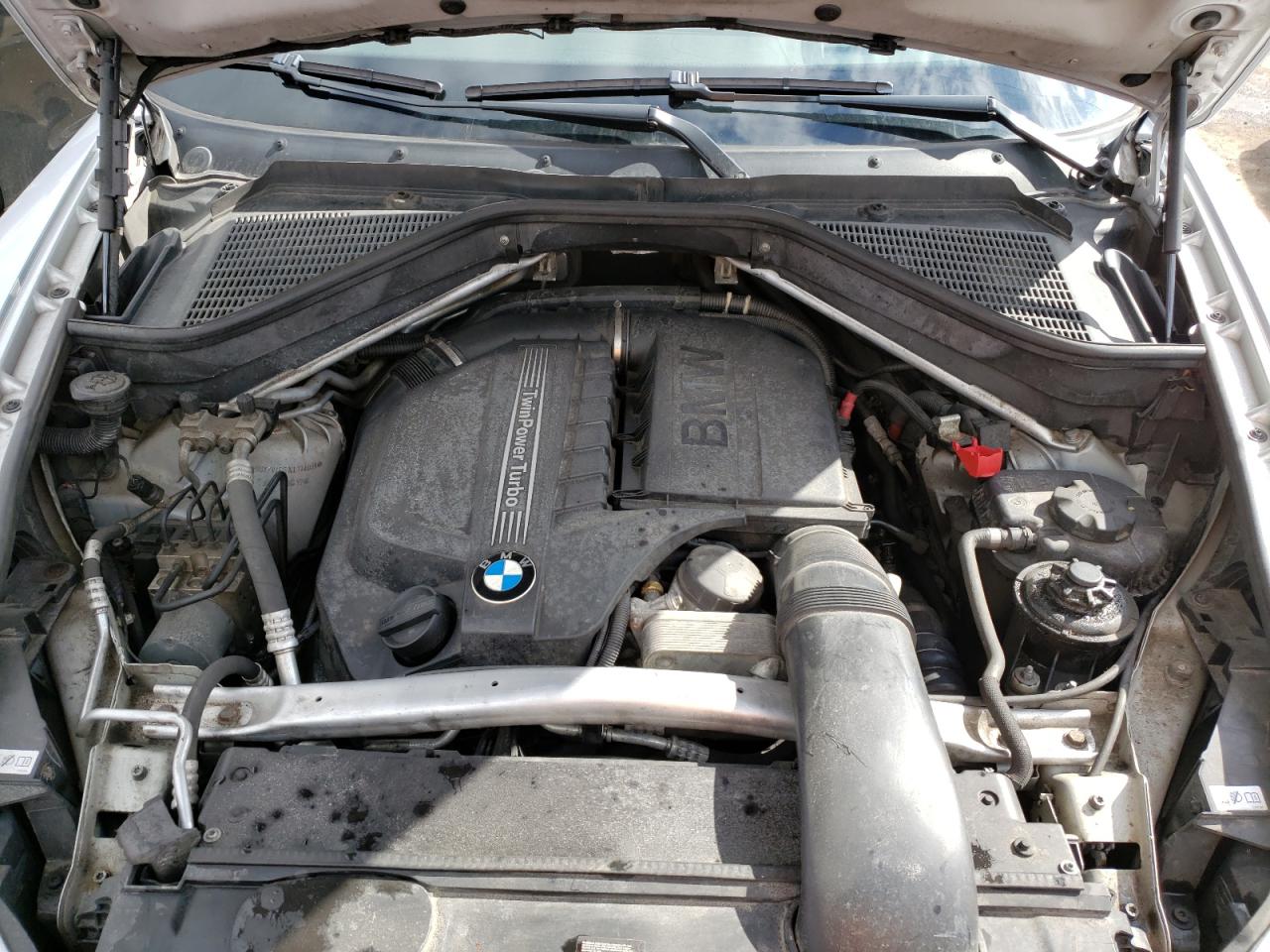 Photo 7 from auction – 2012 BMW X5 XDRIVE3 with VIN 5UXZV4C51CL748068