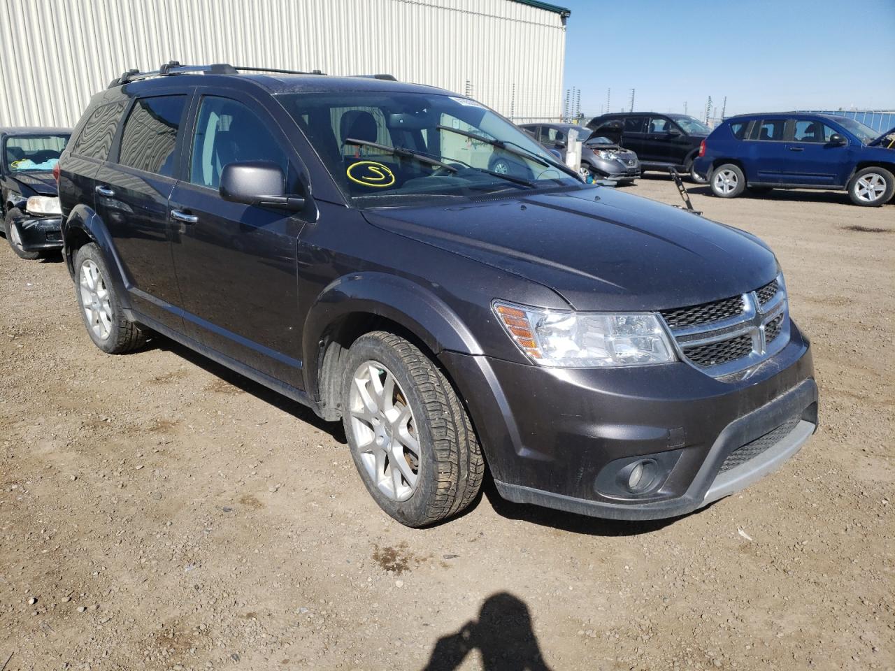 DODGE JOURNEY R/ 2014 with VIN 3C4PDDFGXET249043 - Photo from auction