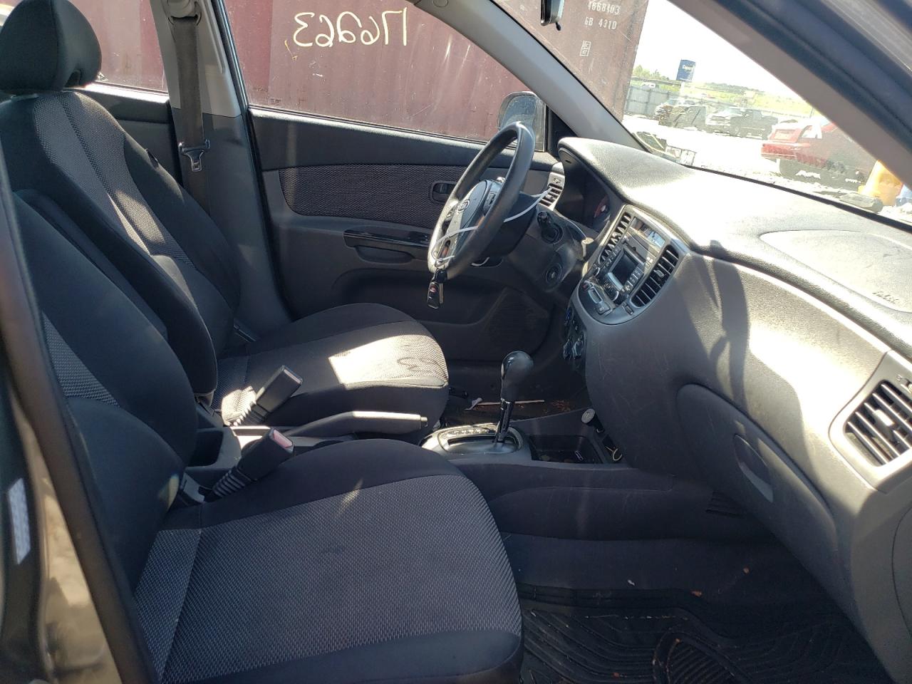 Photo 5 from auction – 2011 KIA RIO BASE with VIN KNADH4A39B6869459