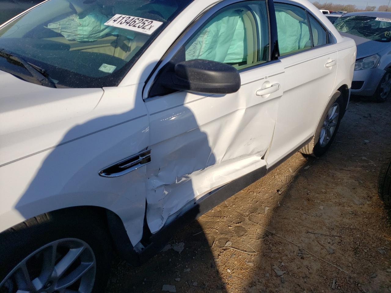 Photo 9 from auction – 2014 FORD TAURUS SE with VIN 1FAHP2D85EG123615