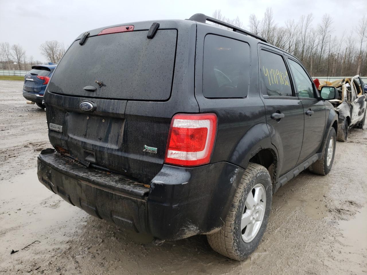 Photo 4 from auction – 2011 FORD ESCAPE XLT with VIN 1FMCU9DGXBKB60323