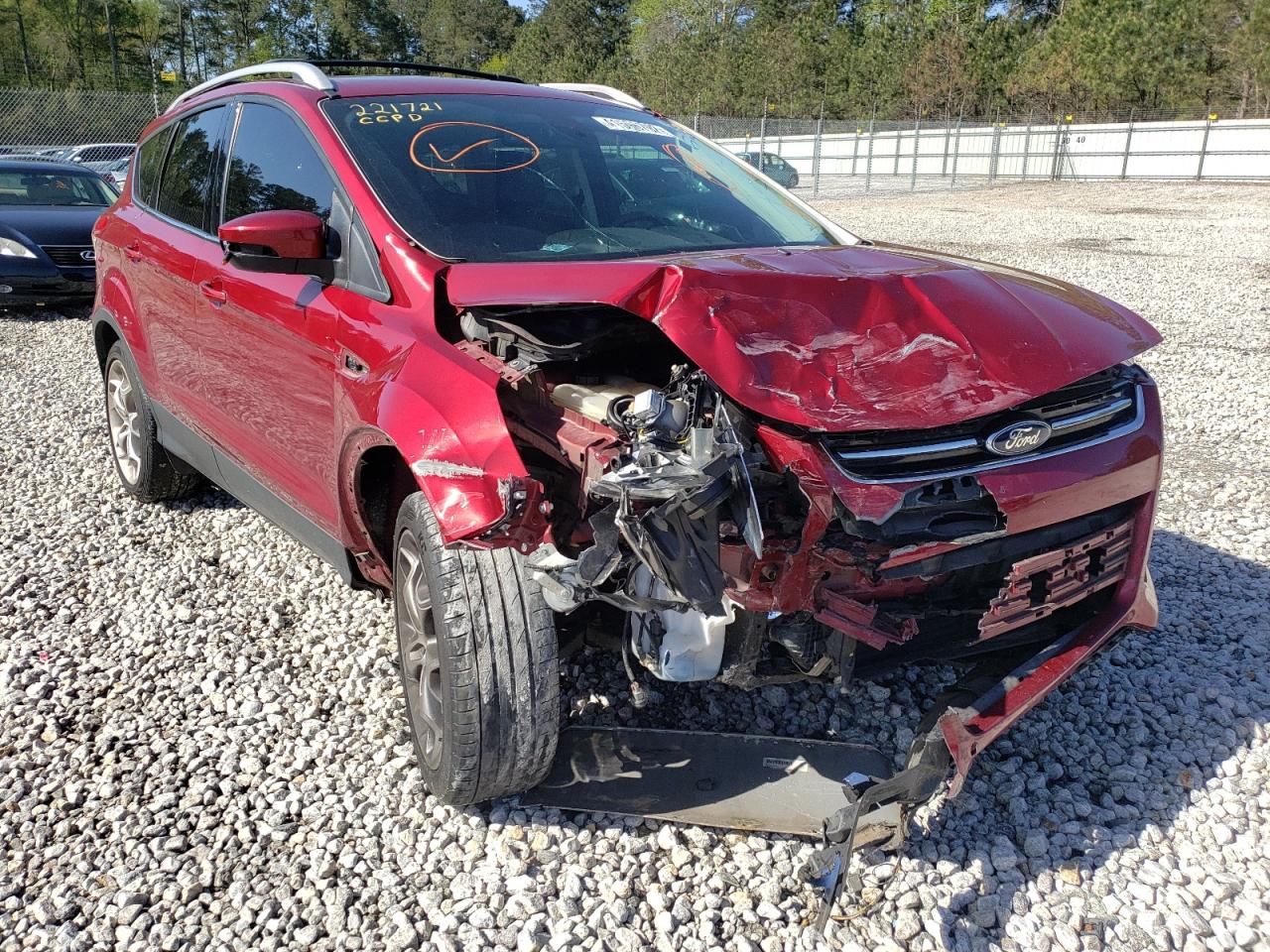 FORD ESCAPE TIT 2015 with VIN 1FMCU9JX2FUB27797 - Photo from auction