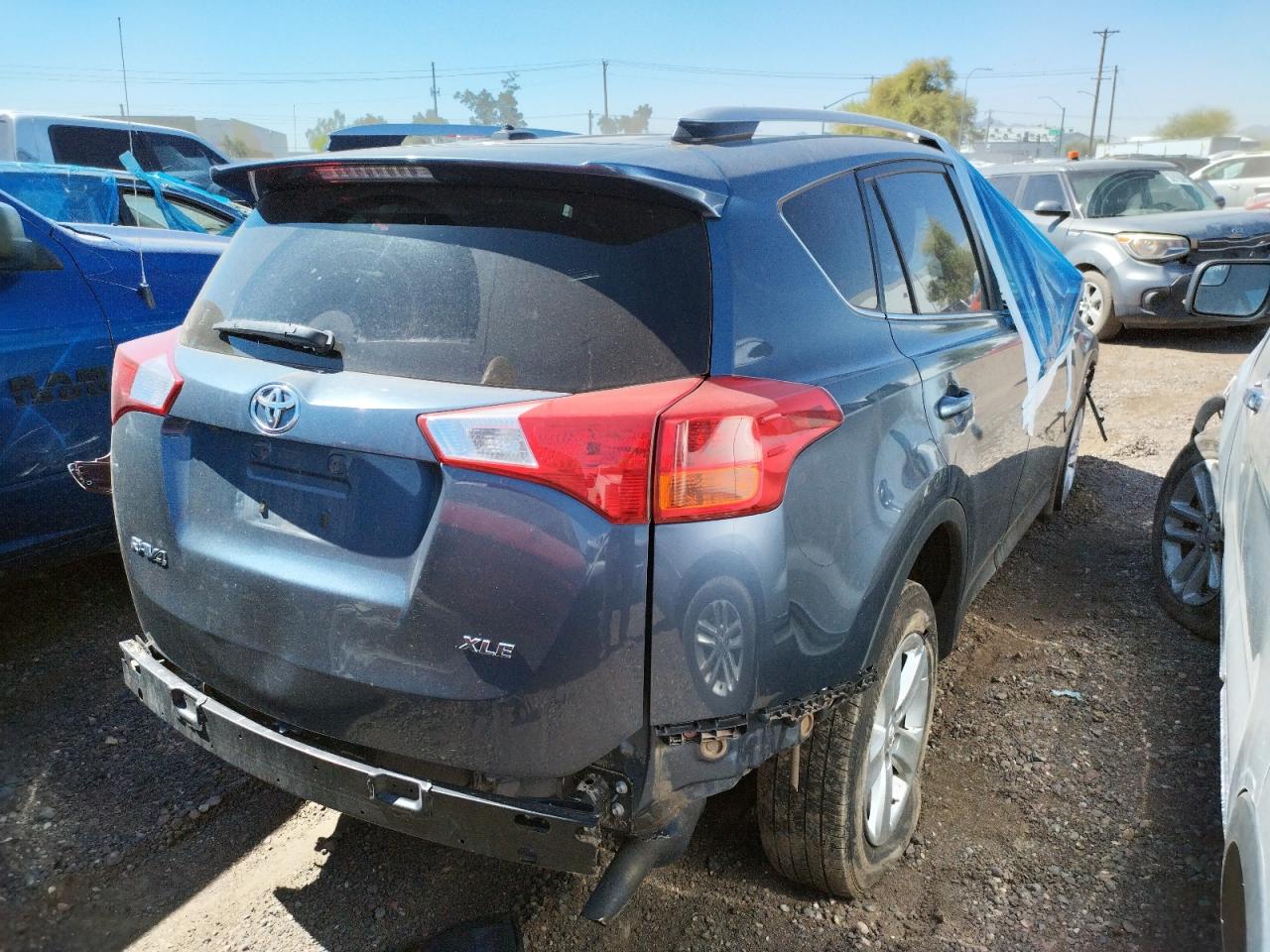 Photo 4 from auction – 2014 TOYOTA RAV4 XLE with VIN JTMWFREV7ED031943