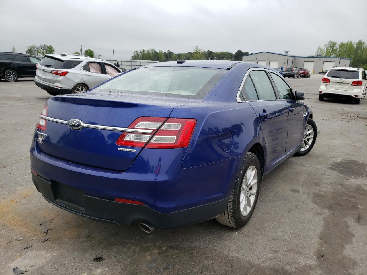 Photo 4 from auction – 2014 FORD TAURUS SE with VIN 1FAHP2D82EG170908