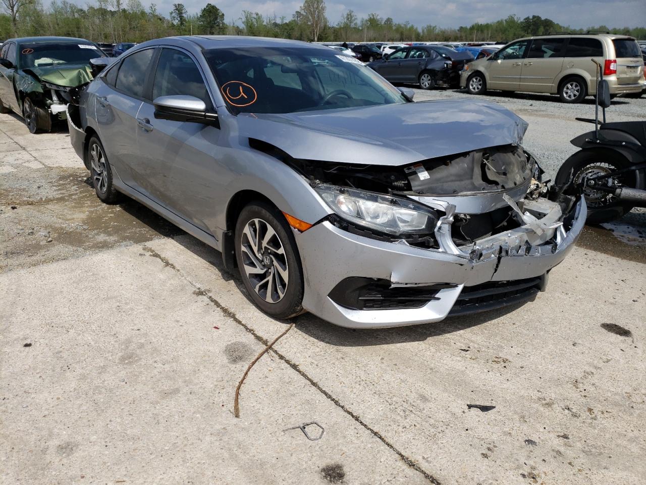 HONDA CIVIC EX 2016 with VIN 19XFC2F72GE086141 - Photo from auction