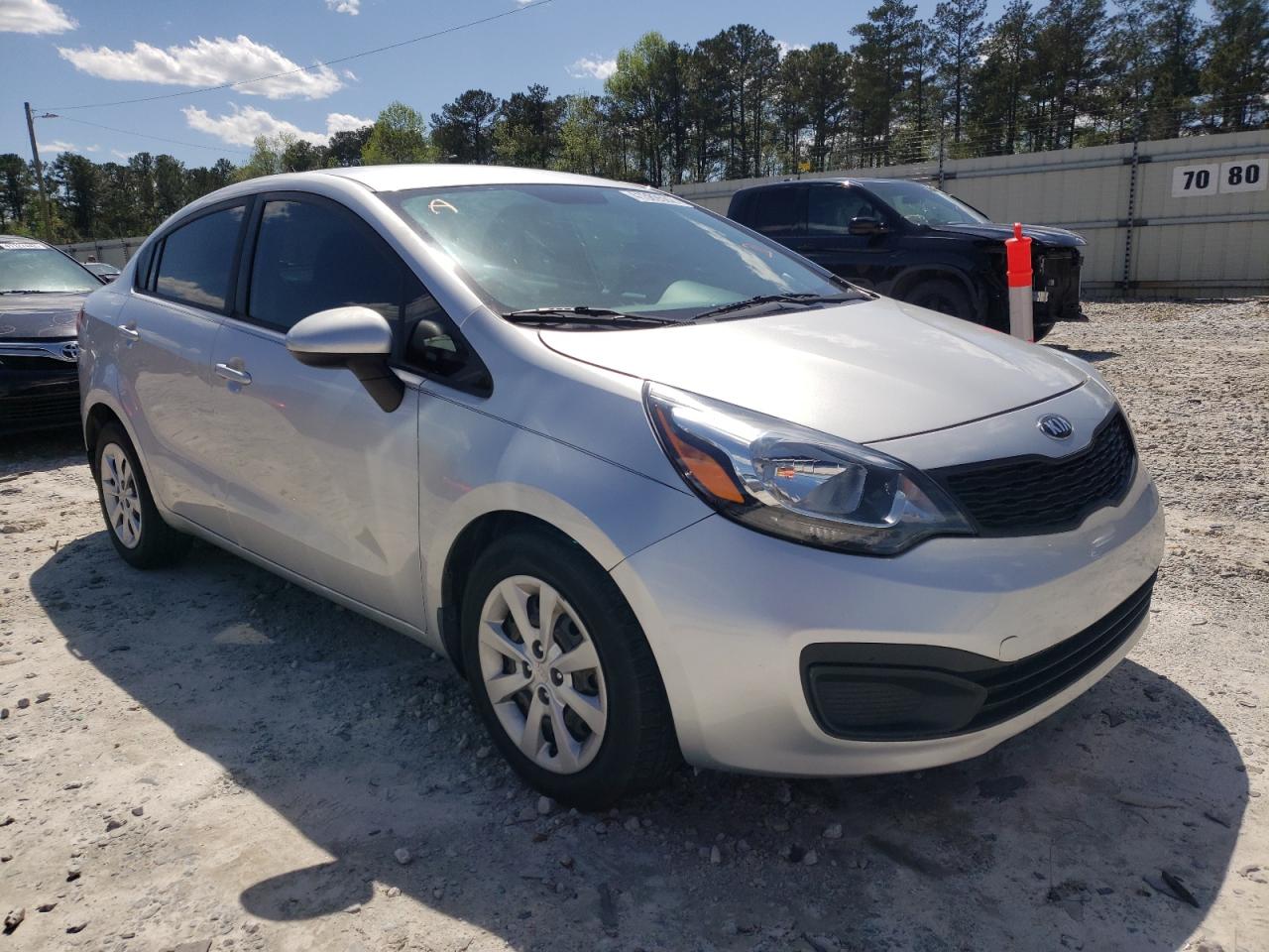 KIA RIO LX 2015 with VIN KNADM4A3XF6527214 - Photo from auction