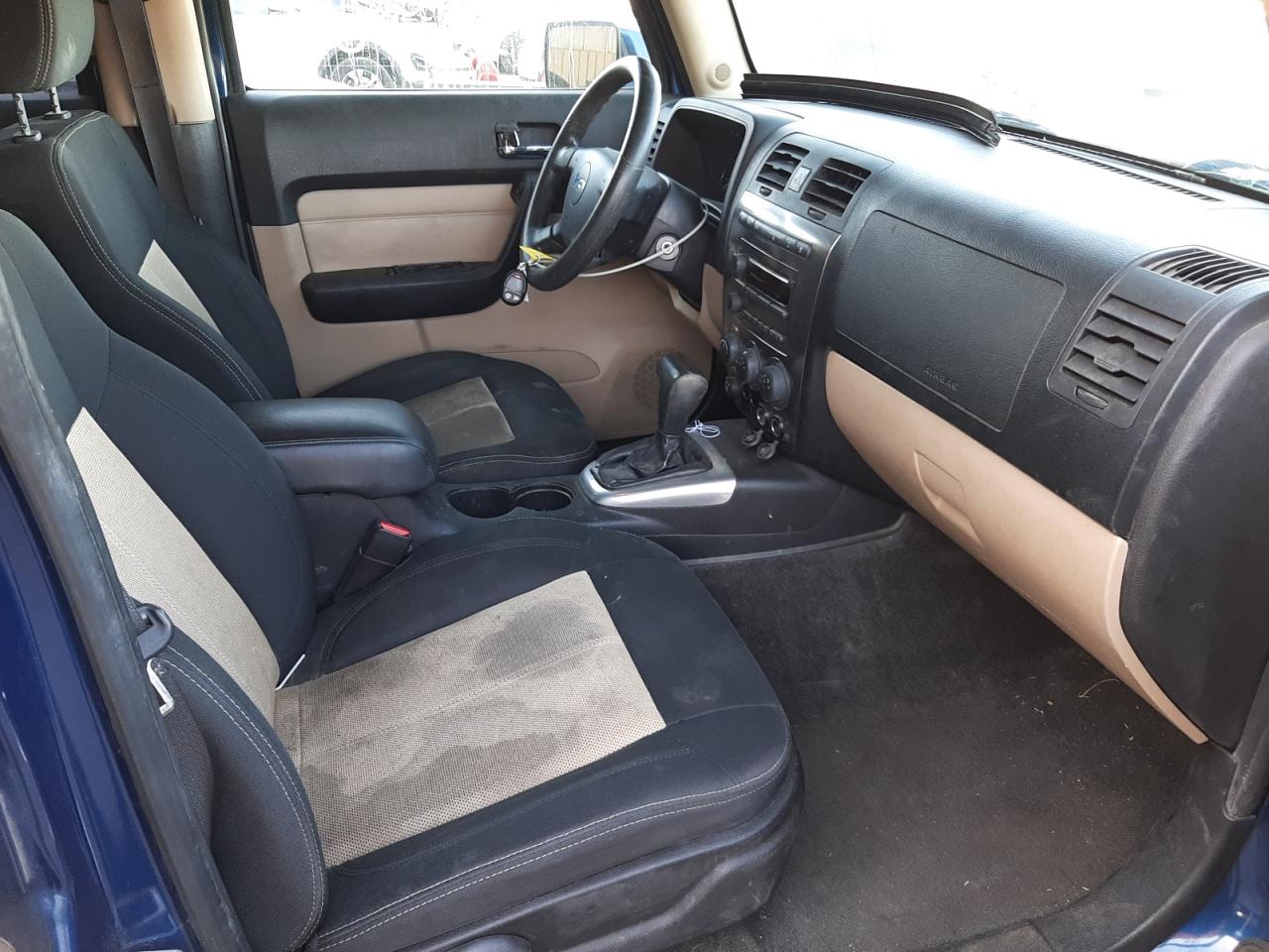 Photo 5 from auction – 2006 HUMMER H3 with VIN 5GTDN136268126324