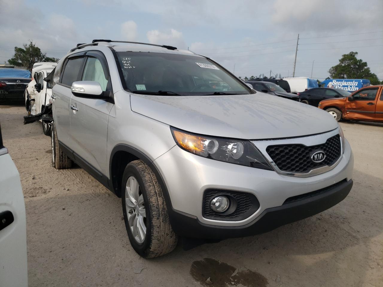 KIA SORENTO EX 2011 with VIN 5XYKU3A16BG178305 - Photo from auction