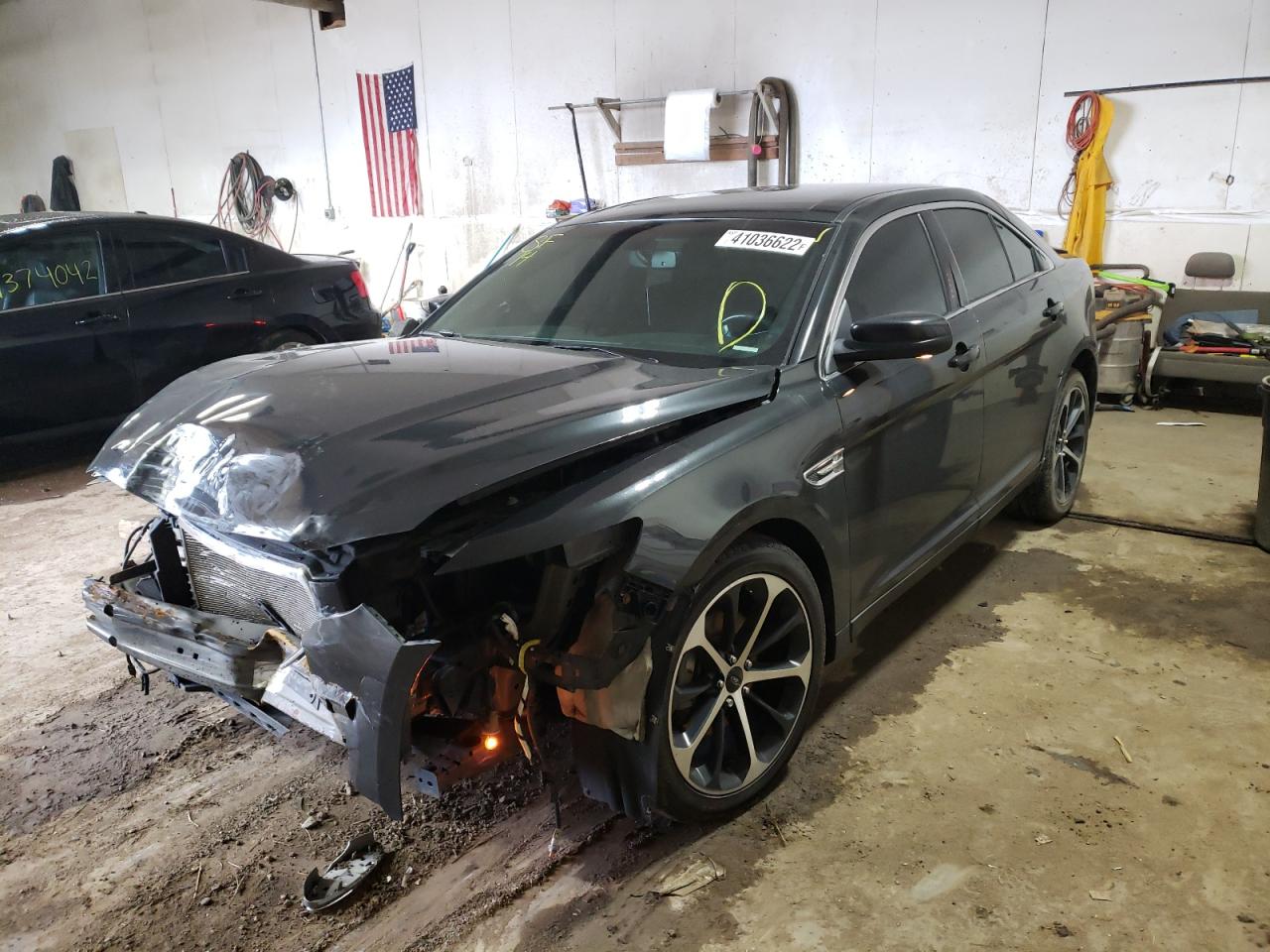 Photo 2 from auction – 2014 FORD TAURUS SEL with VIN 1FAHP2H83EG130041