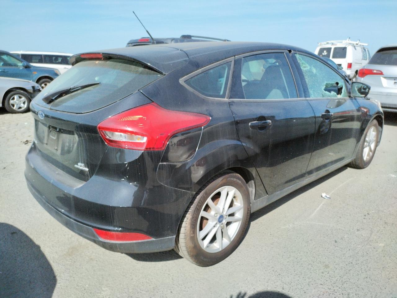 Photo 4 from auction – 2016 FORD FOCUS SE with VIN 1FADP3K28GL287891