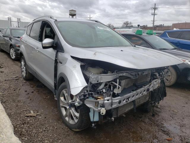 FORD ESCAPE TIT 2014 with VIN 1FMCU0JX7EUB41107 - Photo from auction