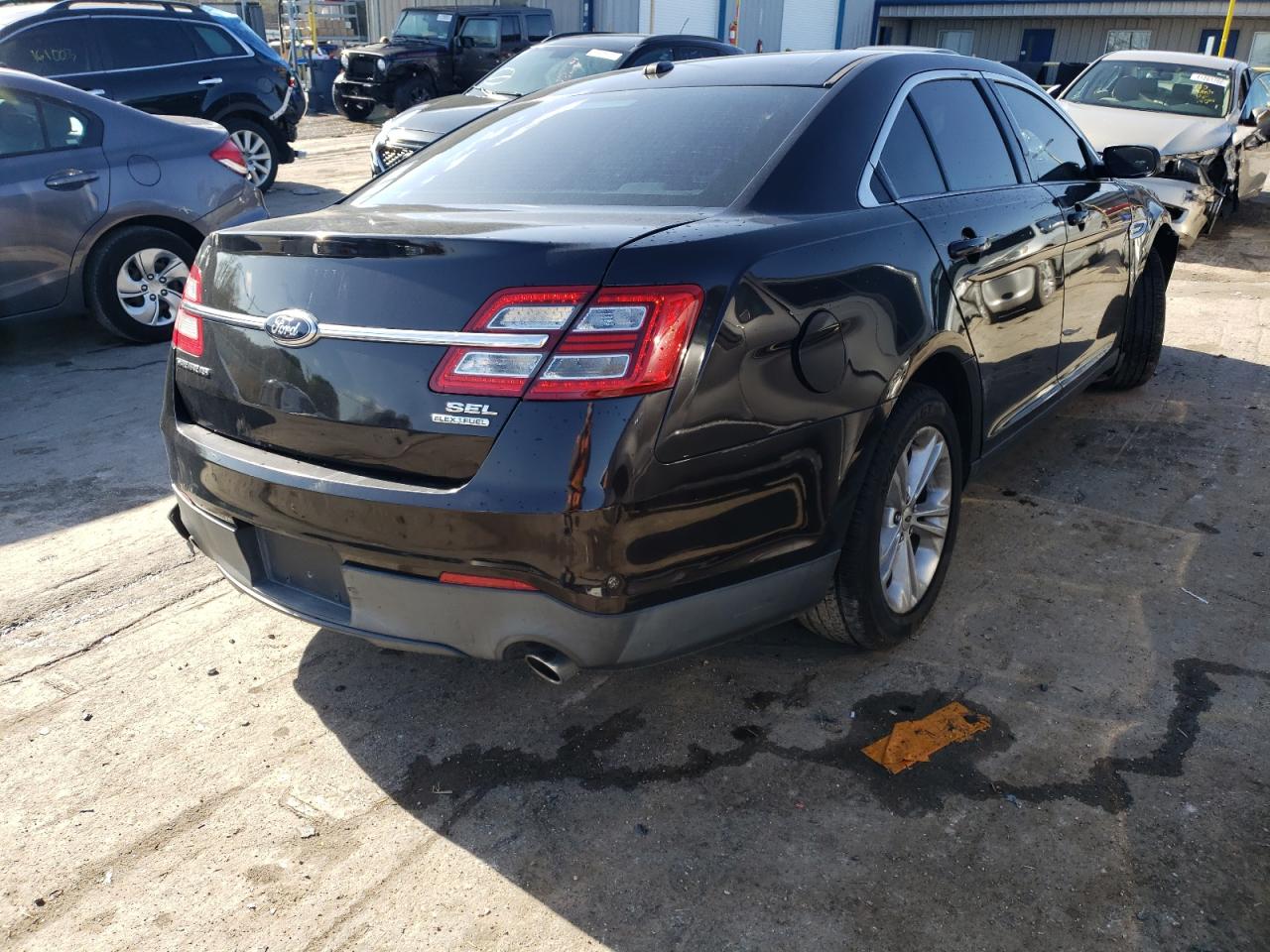Photo 4 from auction – 2013 FORD TAURUS SEL with VIN 1FAHP2E8XDG142139