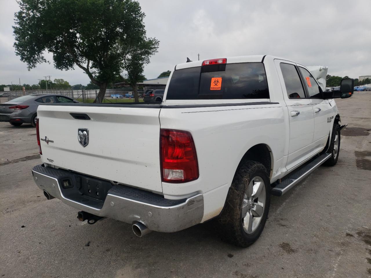 Photo 4 from auction – 2016 RAM 1500 SLT with VIN 1C6RR6LT8GS107597