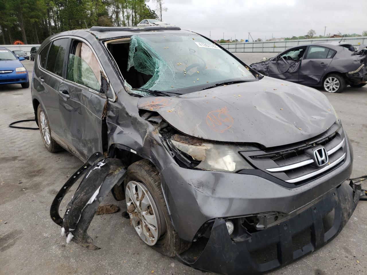Photo 9 from auction – 2014 HONDA CR-V EX with VIN 2HKRM3H58EH514797
