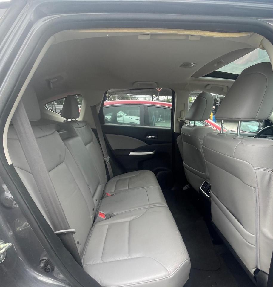 Photo 6 from auction – 2015 HONDA CR-V EXL with VIN 2HKRM3H74FH503203