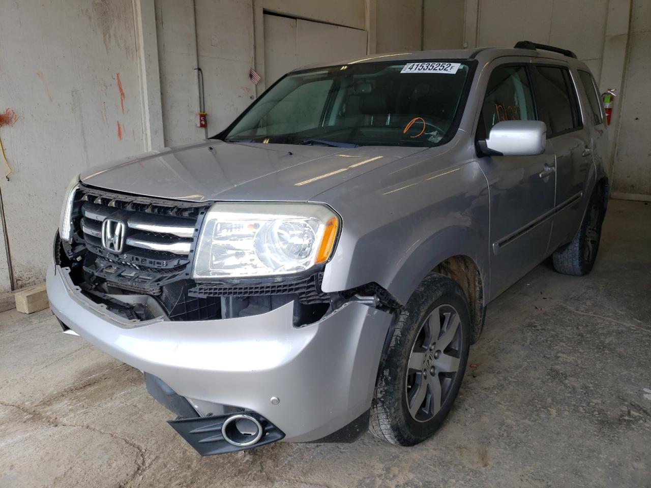 Photo 2 from auction – 2014 HONDA PILOT TOUR with VIN 5FNYF4H96EB055704