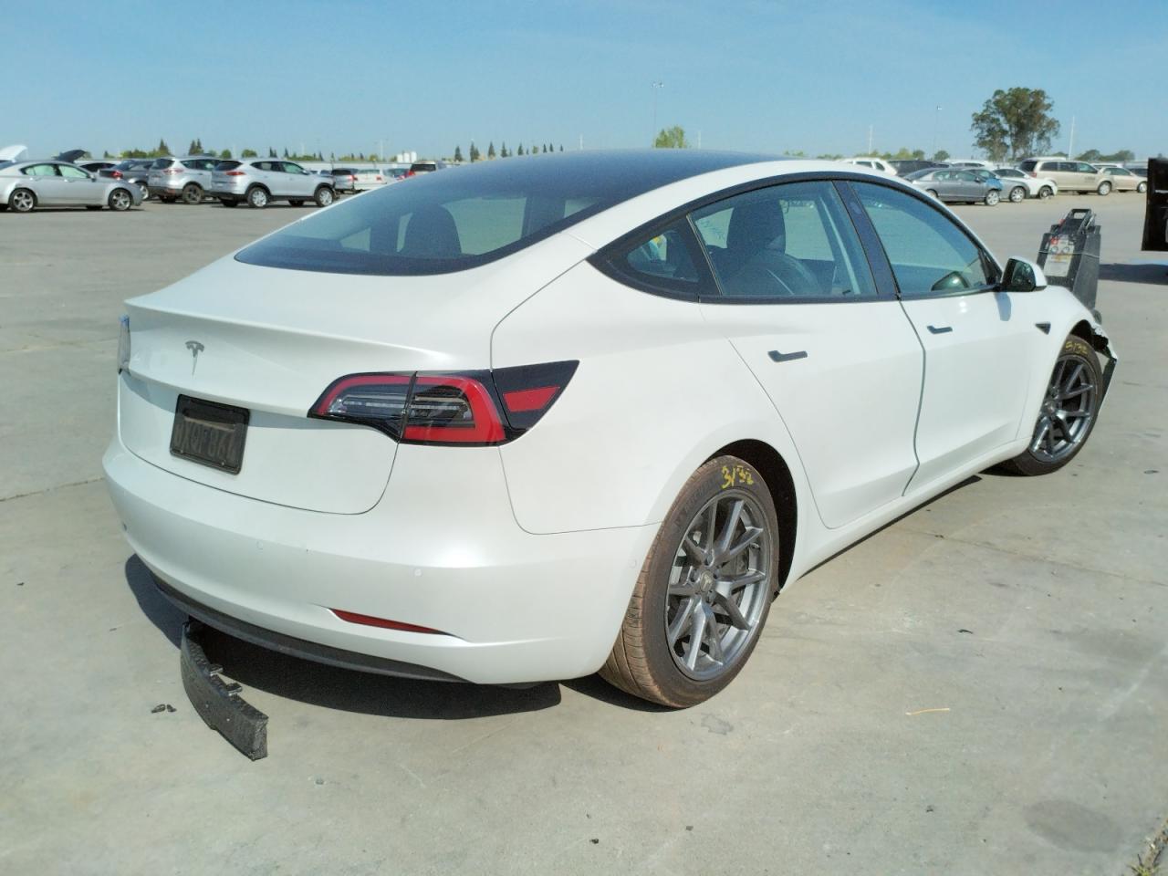 Photo 4 from auction – 2021 TESLA MODEL 3 with VIN 5YJ3E1EAXMF027266