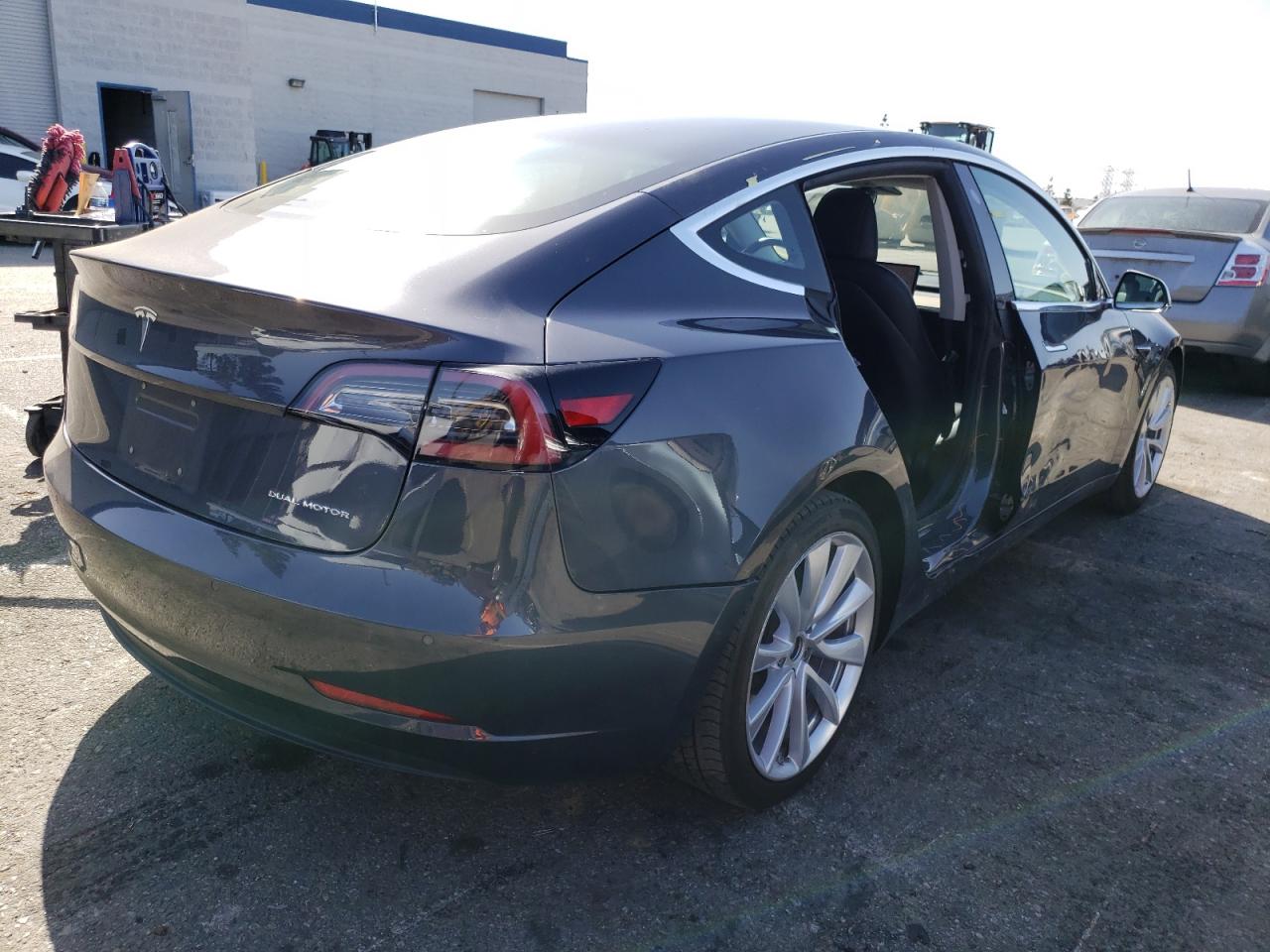 Photo 4 from auction – 2018 TESLA MODEL 3 with VIN 5YJ3E1EB4JF090657