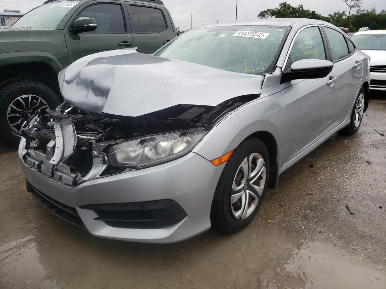 Photo 2 from auction – 2017 HONDA CIVIC LX with VIN 19XFC2F55HE068863