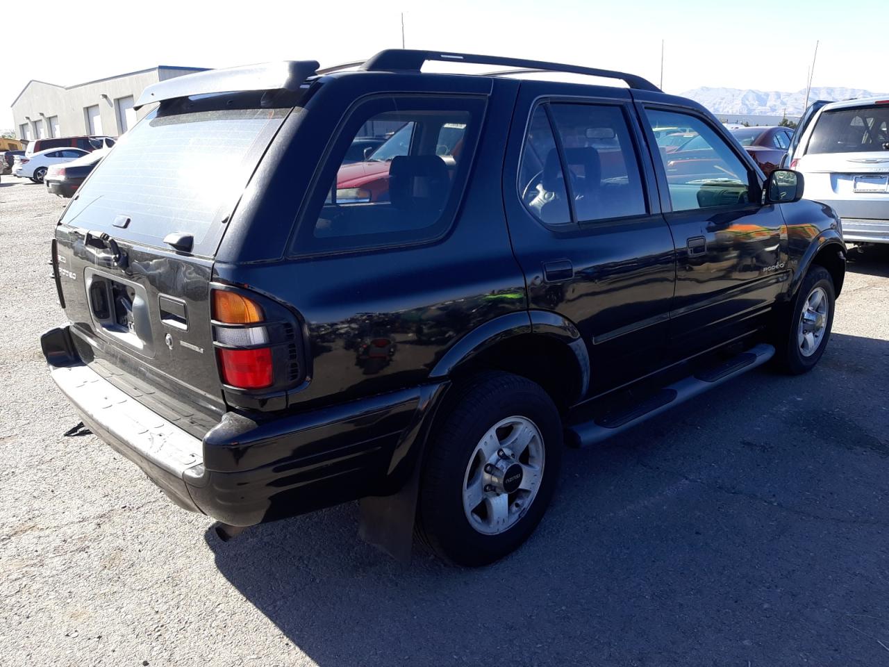 Photo 4 from auction – 1999 ISUZU RODEO S with VIN 4S2CK58W0X4361619