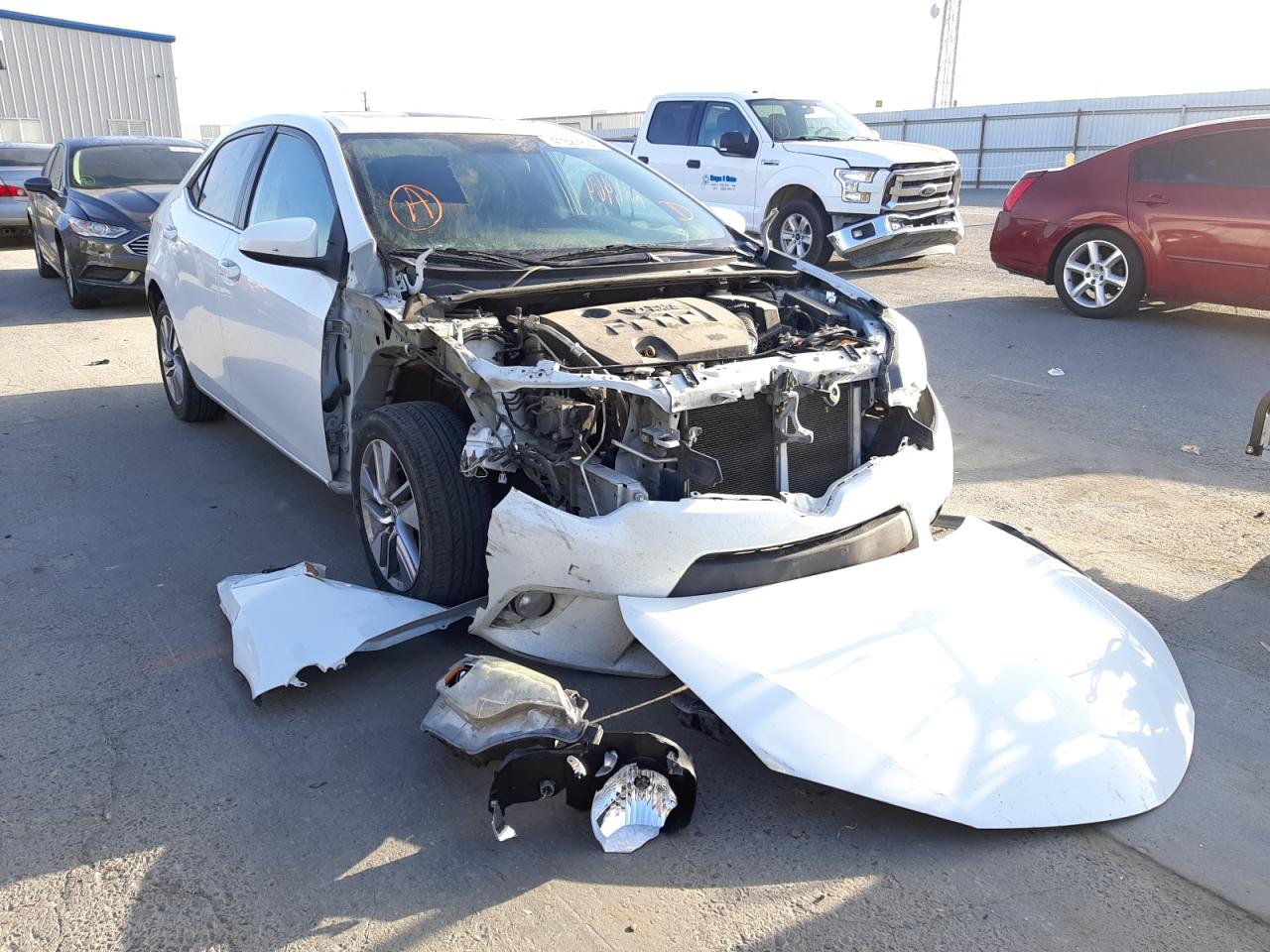 TOYOTA COROLLA EC 2015 with VIN 5YFBPRHEXFP343938 - Photo from auction