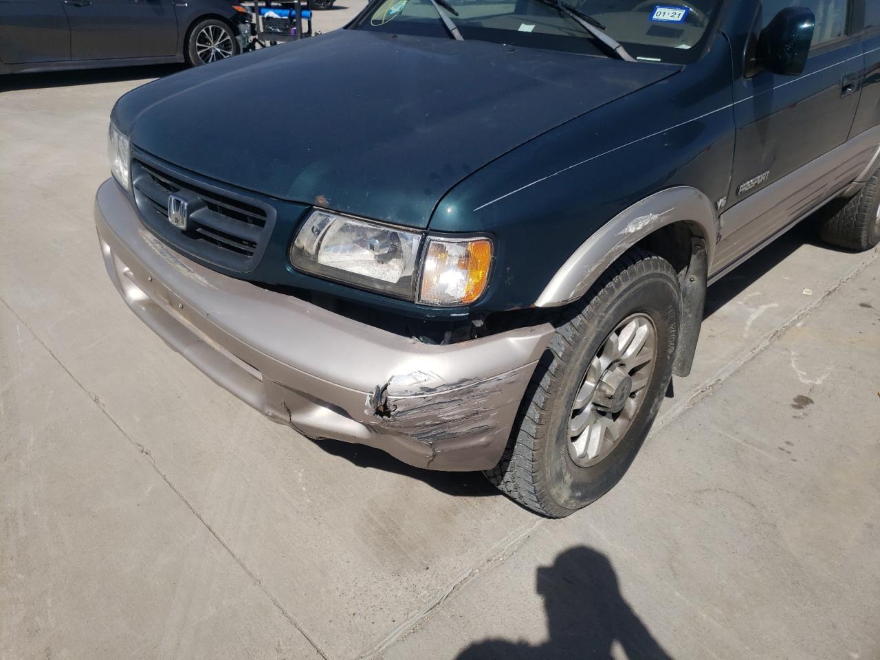 Photo 9 from auction – 2001 HONDA PASSPORT E with VIN 4S6DM58W514402931