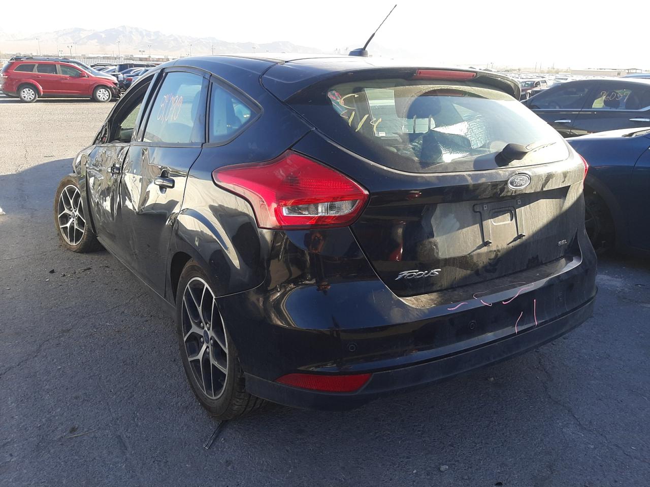 Photo 3 from auction – 2017 FORD FOCUS SEL with VIN 1FADP3M2XHL249478