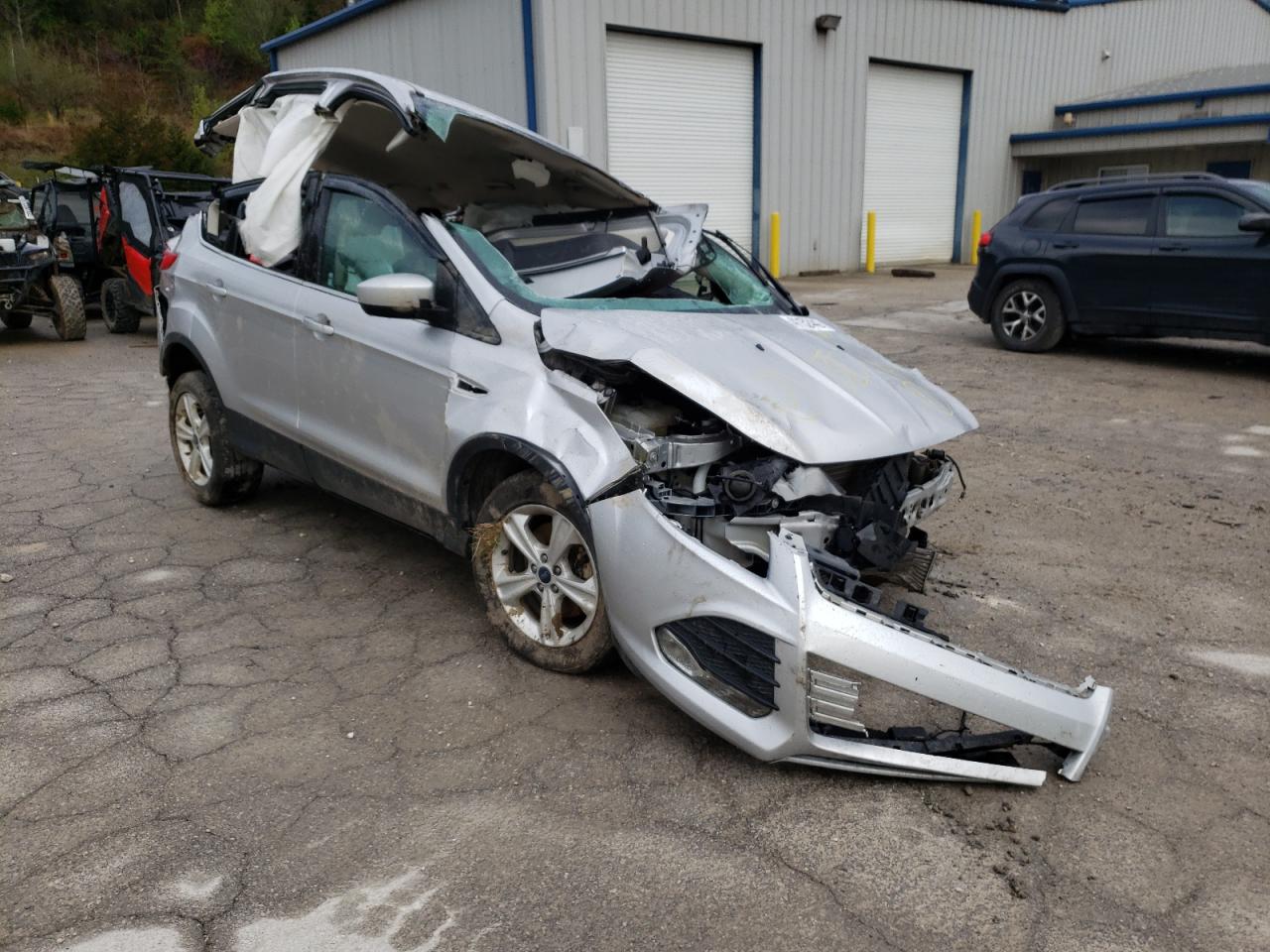 FORD ESCAPE SE 2016 with VIN 1FMCU9GX7GUC86842 - Photo from auction