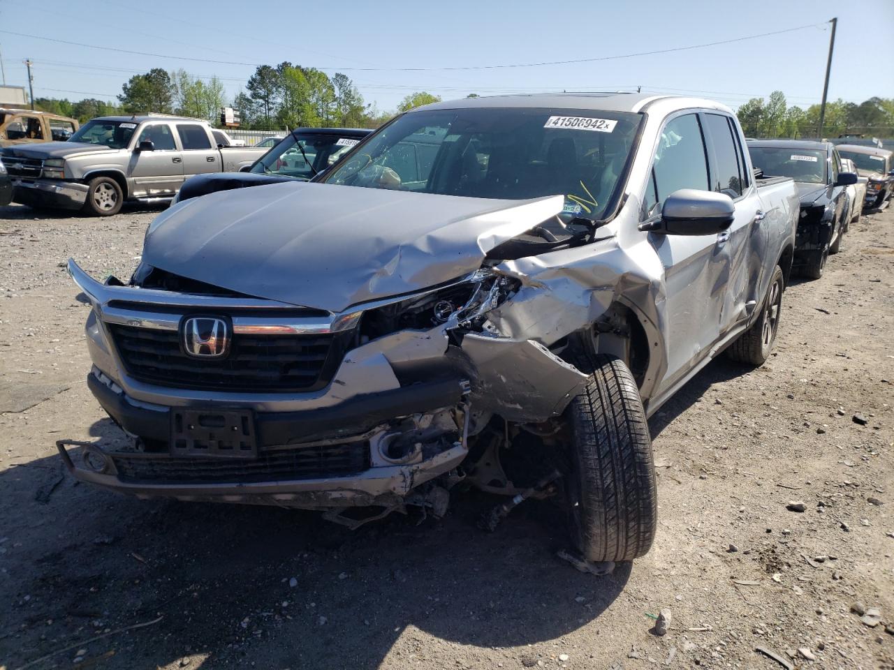Photo 2 from auction – 2017 HONDA RIDGELINE with VIN 5FPYK3F73HB011856