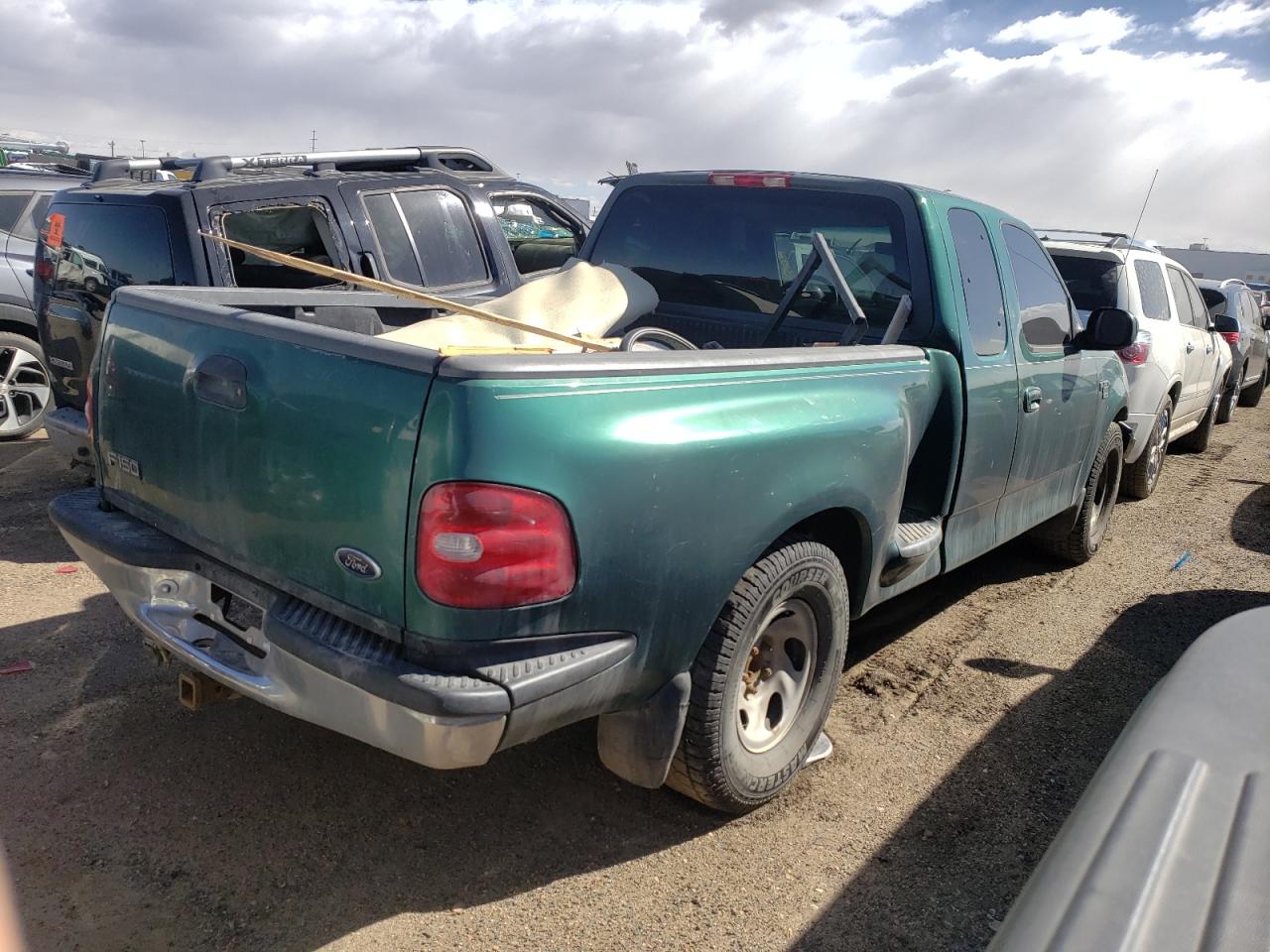 Photo 4 from auction – 1999 FORD F150 with VIN 1FTRX07L1XKB79814