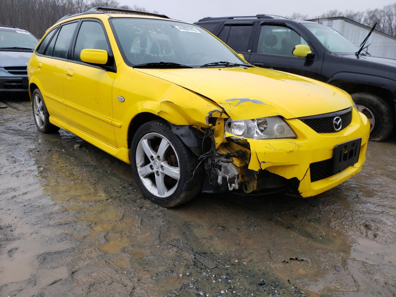 Photo 9 from auction – 2002 MAZDA PROTEGE PR with VIN JM1BJ245021623204
