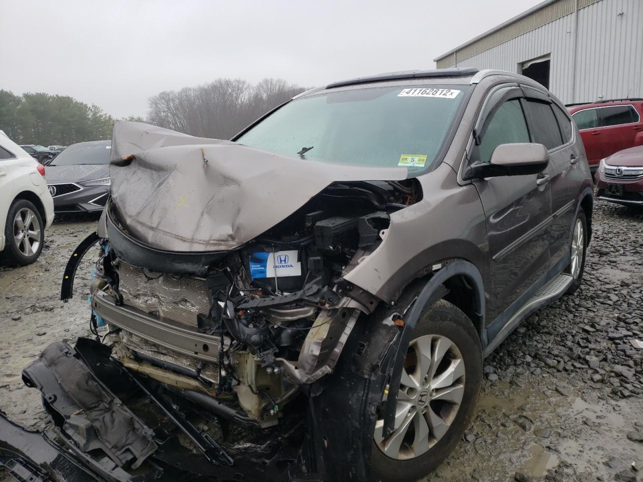 Photo 2 from auction – 2014 HONDA CR-V EXL with VIN 5J6RM4H71EL082261