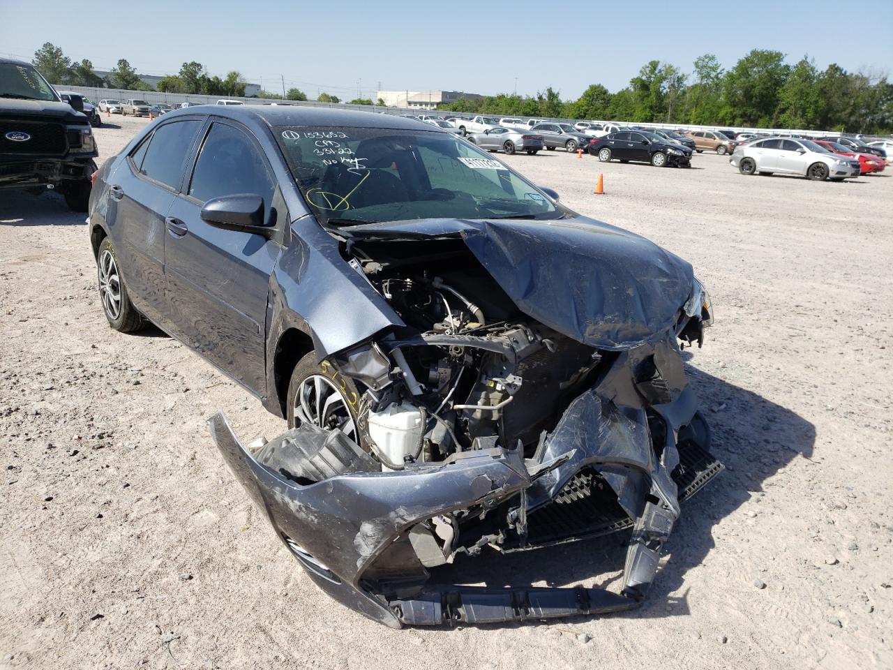 TOYOTA COROLLA L 2017 with VIN 5YFBURHE0HP645122 - Photo from auction