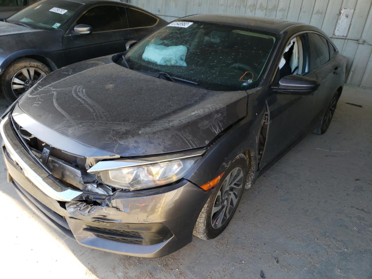 Photo 2 from auction – 2018 HONDA CIVIC EX with VIN 19XFC2F75JE020951