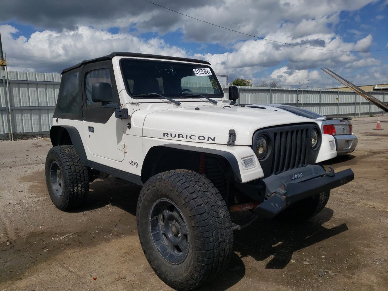 JEEP WRANGLER / 2004 with VIN 1J4FA69S84P712472 - Photo from auction