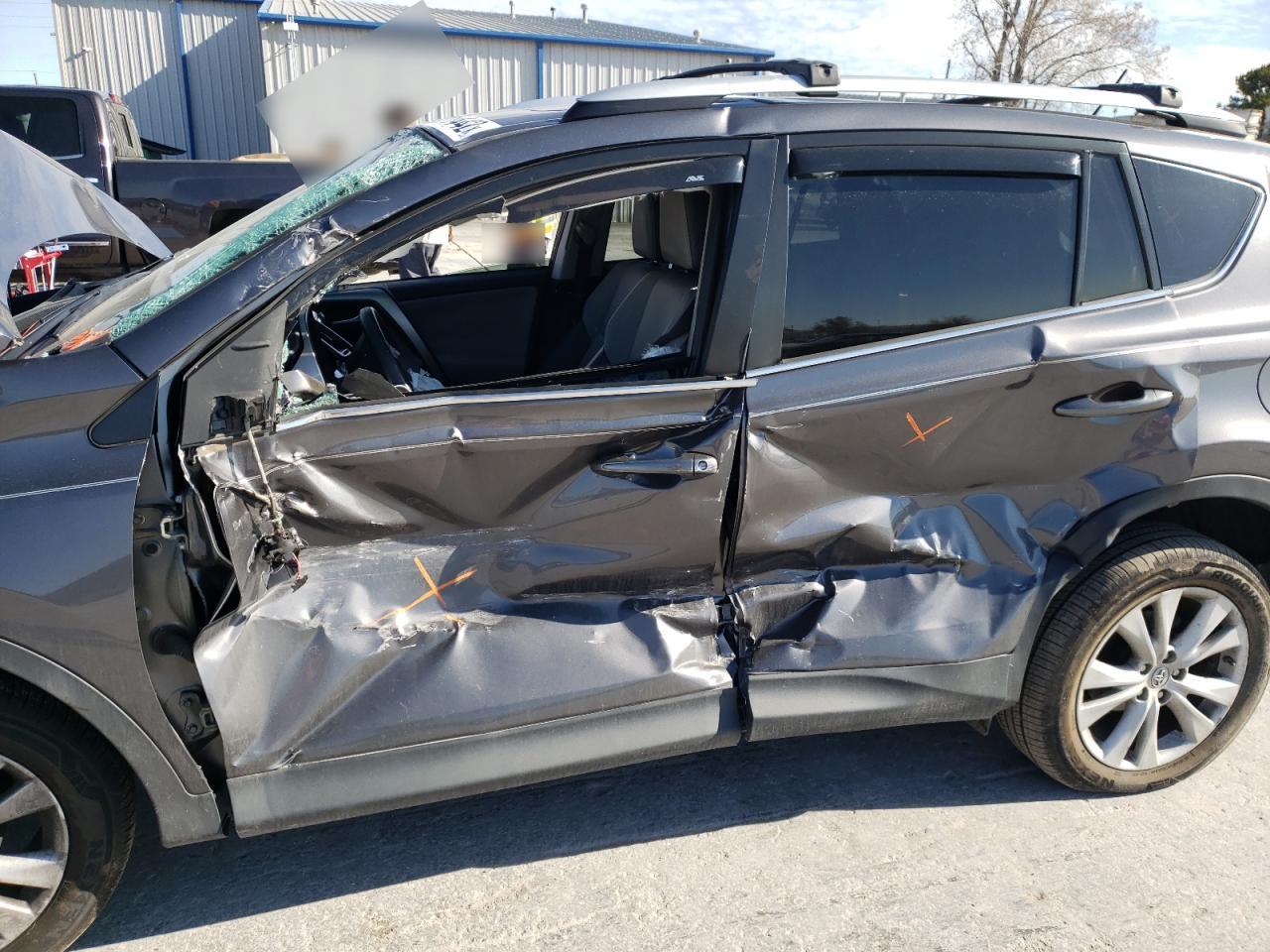 Photo 9 from auction – 2014 TOYOTA RAV4 LIMIT with VIN 2T3DFREV0EW147852