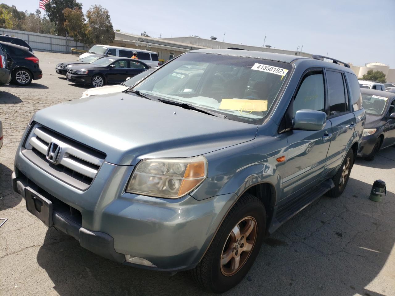 Photo 2 from auction – 2006 HONDA PILOT EX with VIN 2HKYF18456H538073