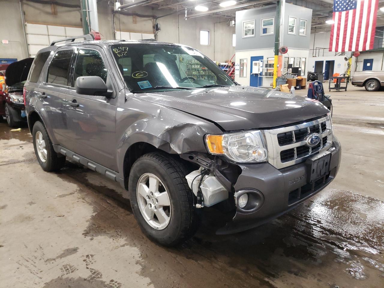 FORD ESCAPE XLT 2011 with VIN 1FMCU0DG3BKC70710 - Photo from auction