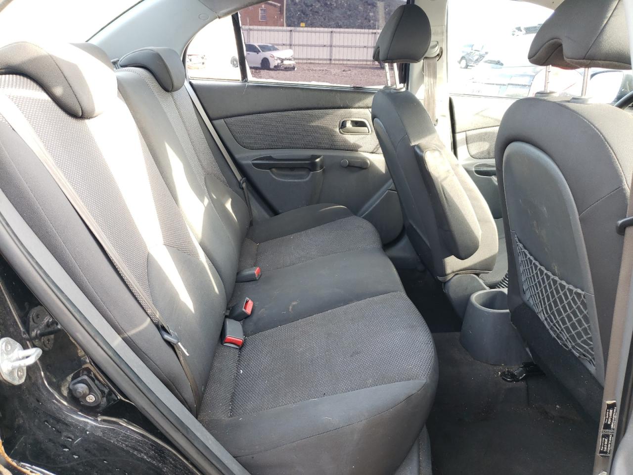Photo 6 from auction – 2011 KIA RIO BASE with VIN KNADH4A3XB6857160