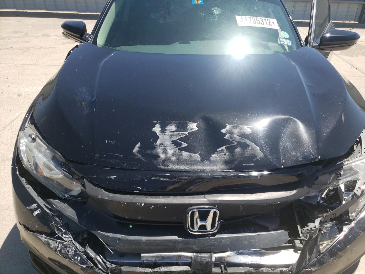 Photo 7 from auction – 2018 HONDA CIVIC EX with VIN 19XFC2F74JE015028