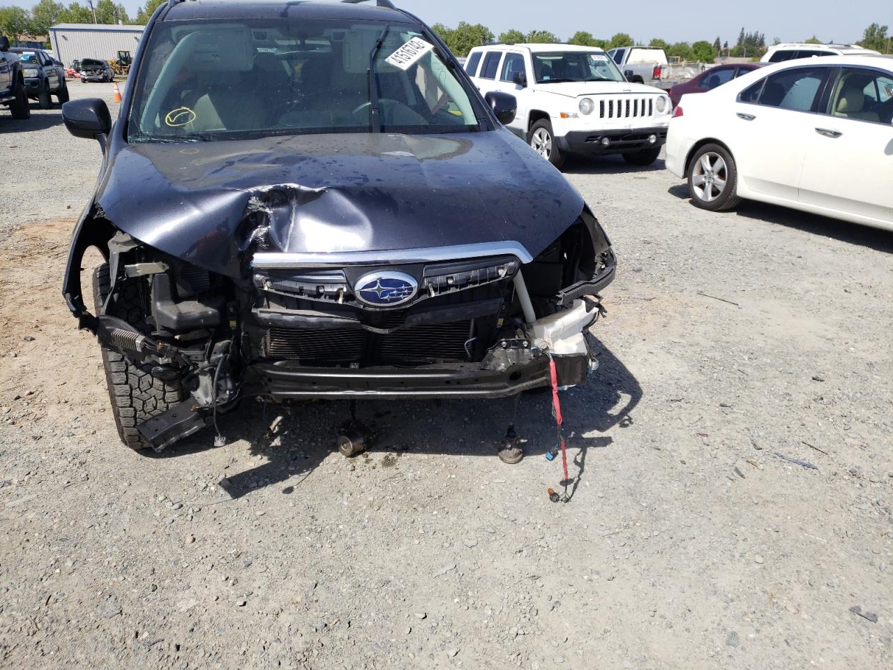 Photo 9 from auction – 2016 SUBARU FORESTER 2 with VIN JF2SJARC1GH414264